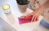 Playtray hygienic cleaning drying tray adult sex toy vibrator hot pink hand with plant and candle